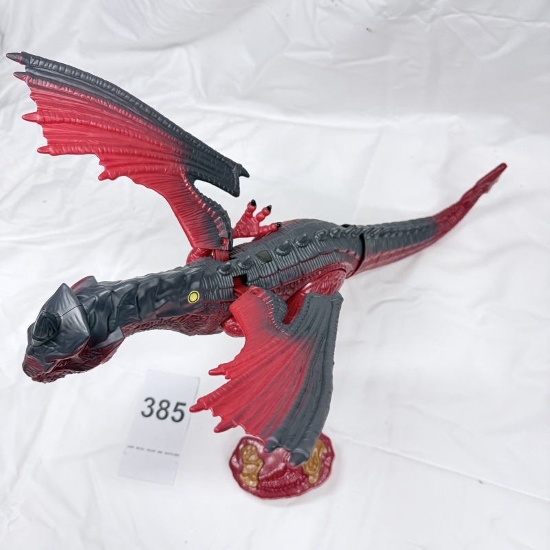 Lot 385: Red & black winged dragon dinosaur toy with light-up eyes and roar sound, remote control walking action figure