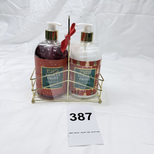 Lot 387: Brompton & Langley "Vanilla Frost" hand wash & lotion set with gold wire caddy, 16.9 fl oz each