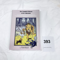 Lot 393: L. Frank Baum "The Complete Wizard of Oz Collection" paperback book, 6 Oz novels compilation