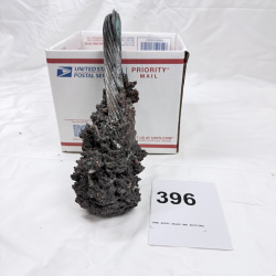 Lot 396: Fulgurite/melted copper wire cable mass with fused slag, lightning strike fulgurite specimen