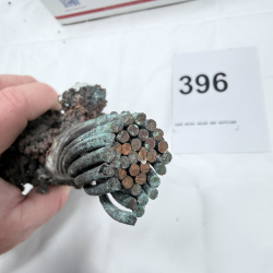 Lot 396: Fulgurite/melted copper wire cable mass with fused slag, lightning strike fulgurite specimen