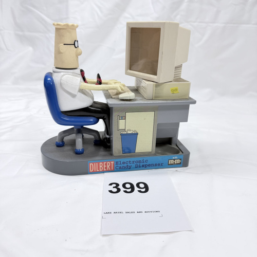 Lot 399: 1990s Dilbert Electronic Candy Dispenser with M&M's, United Media desk figure