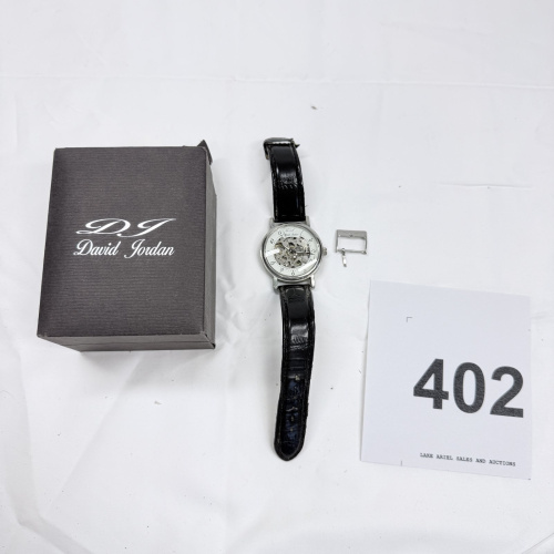 Lot 402: David Jordan "Speed Master 00/57 Professional" men's skeleton automatic watch, black leather strap, with box