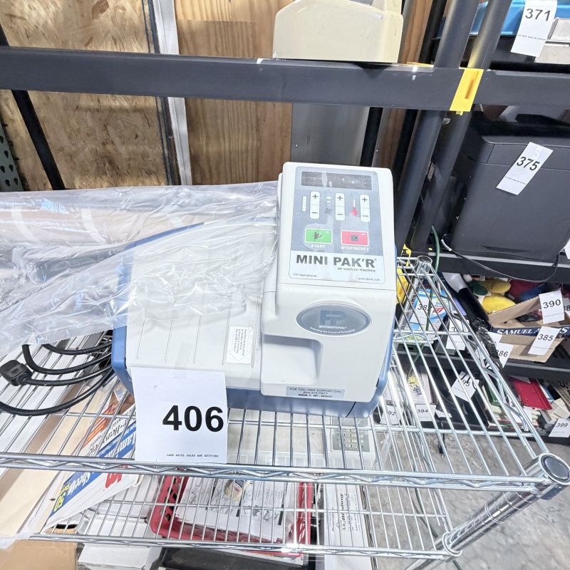 Lot 406: FP International Mini Pak'R air cushion machine, Model MMP01MNPKR with film roll