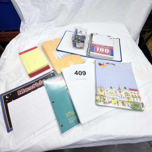 Lot 409: Office supply lot: 3-ring binder, Pilot pens, filler paper, legal pads, clasp envelopes, Christmas stationery, memo pads