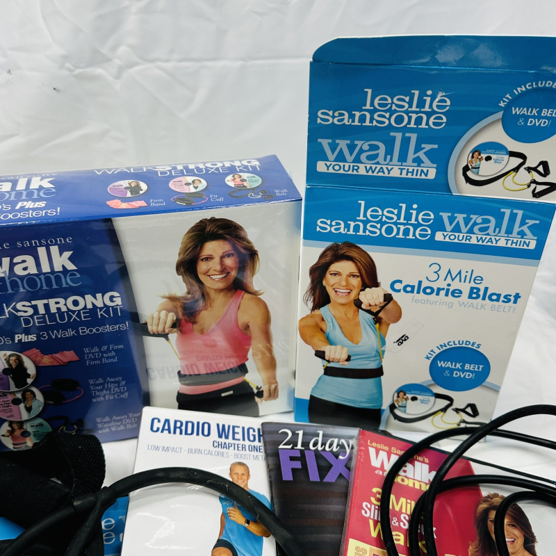 Lot 415: Fitness equipment lot: Flex Belt, Leslie Sansone Walk at Home DVD kits, resistance bands, PiYo, Body Beast, 21 Day Fix DVDs