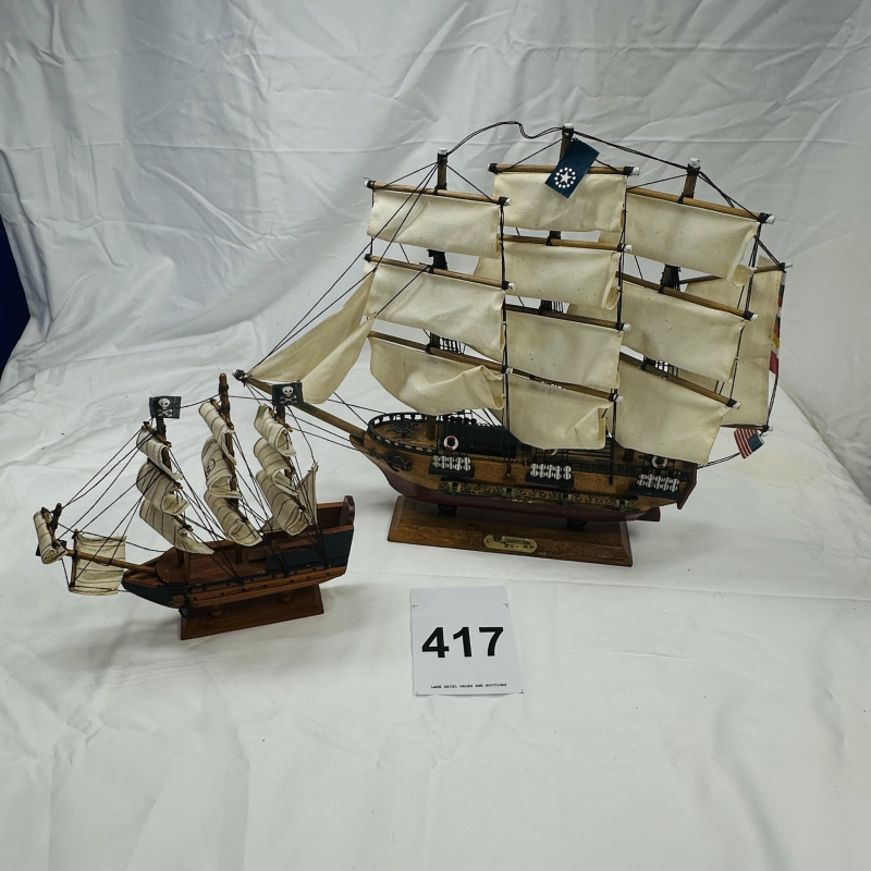 Lot 417: USS Constitution 1797 wooden tall ship model with wooden stand, plus small pirate galleon ship model, set of 2