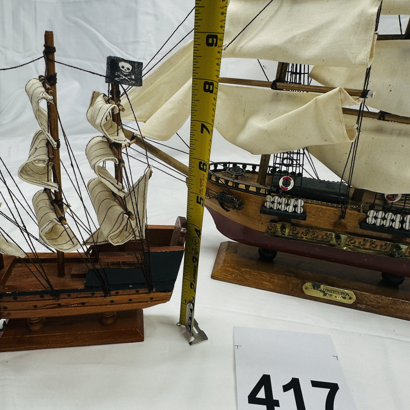 Lot 417: USS Constitution 1797 wooden tall ship model with wooden stand, plus small pirate galleon ship model, set of 2
