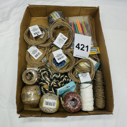 Lot 421: Craft supply lot: assorted jute twine, rope, and cotton bakers twine skeins with birthday candles