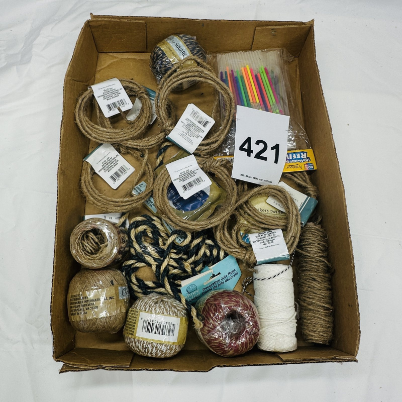 Lot 421: Craft supply lot: assorted jute twine, rope, and cotton bakers twine skeins with birthday candles