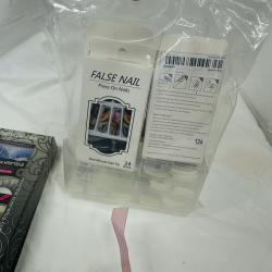 Lot 422: Cosmetics lot: KISS Eyelash Kit "Create the Look" Glam Girl Palette, False Nail Press-On Nail sets, KISS Acrylic Nail Kit, Simple Pleasures "Shine All The Way" 14-piece Nail Polish Collection