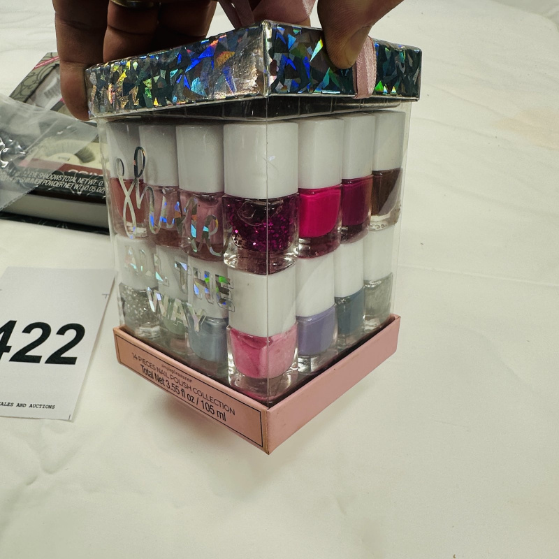 Lot 422: Cosmetics lot: KISS Eyelash Kit "Create the Look" Glam Girl Palette, False Nail Press-On Nail sets, KISS Acrylic Nail Kit, Simple Pleasures "Shine All The Way" 14-piece Nail Polish Collection