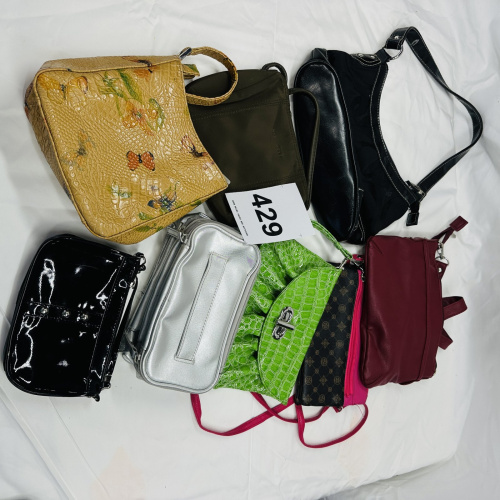 Lot 429: Assorted women's handbags and purses, mixed styles and colours, lot of 8
