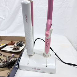 Lot 439: BarBar flat iron & curling iron with charging stand, plus hair clip/barrette accessory lot