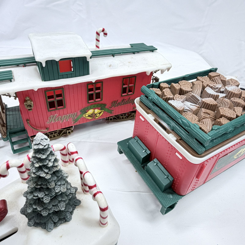 Lot 442: New Bright "Winter Belle" Holiday Express Christmas train set, engine, tender, caboose & cars w/ track