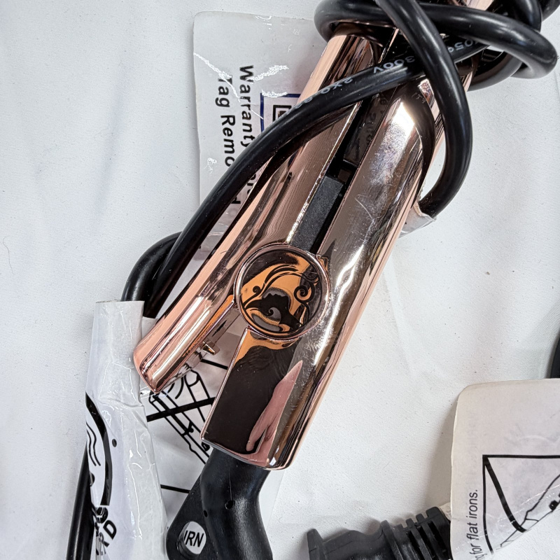 Lot 443: Assorted hair styling tool lot: Revlon hair dryer, Beyond the Beauty & Aquarius crimping/flat irons, curling irons