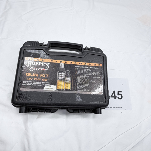 Lot 445: Hoppe's Elite "Gun Kit on the Go" lockable gun cleaning case with Gunmaster .357/.38/9mm cleaning kit