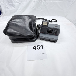 Lot 451: Vintage Polaroid Impulse instant camera with leather carrying case