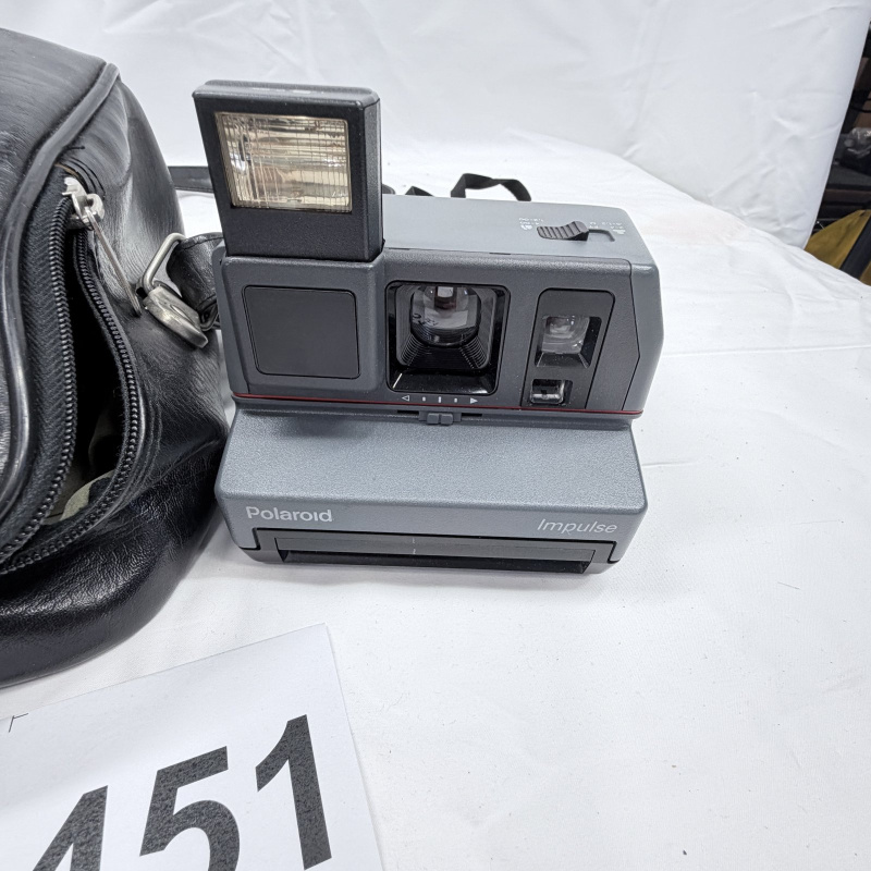 Lot 451: Vintage Polaroid Impulse instant camera with leather carrying case