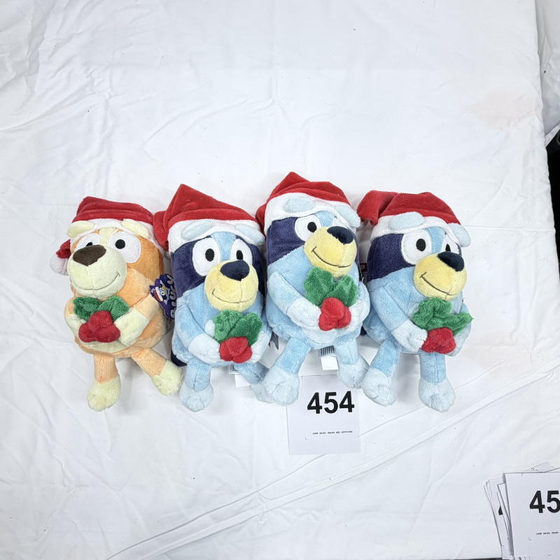 Lot 454: DamDee Bluey Holiday plush set, Bluey & Bandit Santa hats with holly, 4 pieces