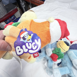 Lot 454: DamDee Bluey Holiday plush set, Bluey & Bandit Santa hats with holly, 4 pieces