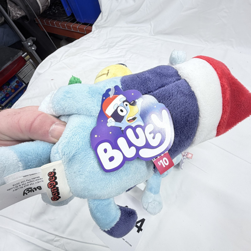 Lot 454: DamDee Bluey Holiday plush set, Bluey & Bandit Santa hats with holly, 4 pieces