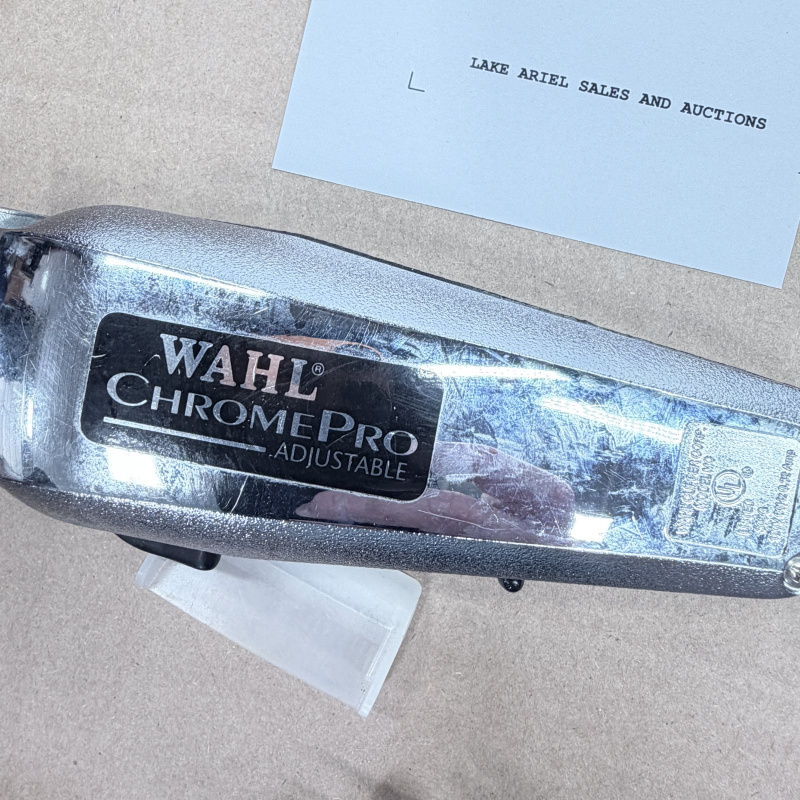 Lot 460: Wahl ChromePro Adjustable hair clipper with attachment combs, corded