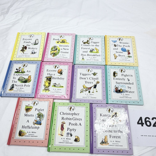 Lot 462: A.A. Milne "The Original Pooh Treasury" illustrated by Ernest H. Shepard, set of 11 hardcover mini books