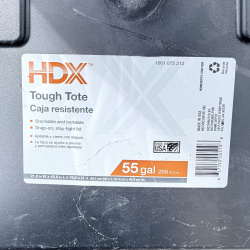 Lot 652: HDX "Tough Tote" 55 gallon storage container, black base with yellow lid, stackable/lockable