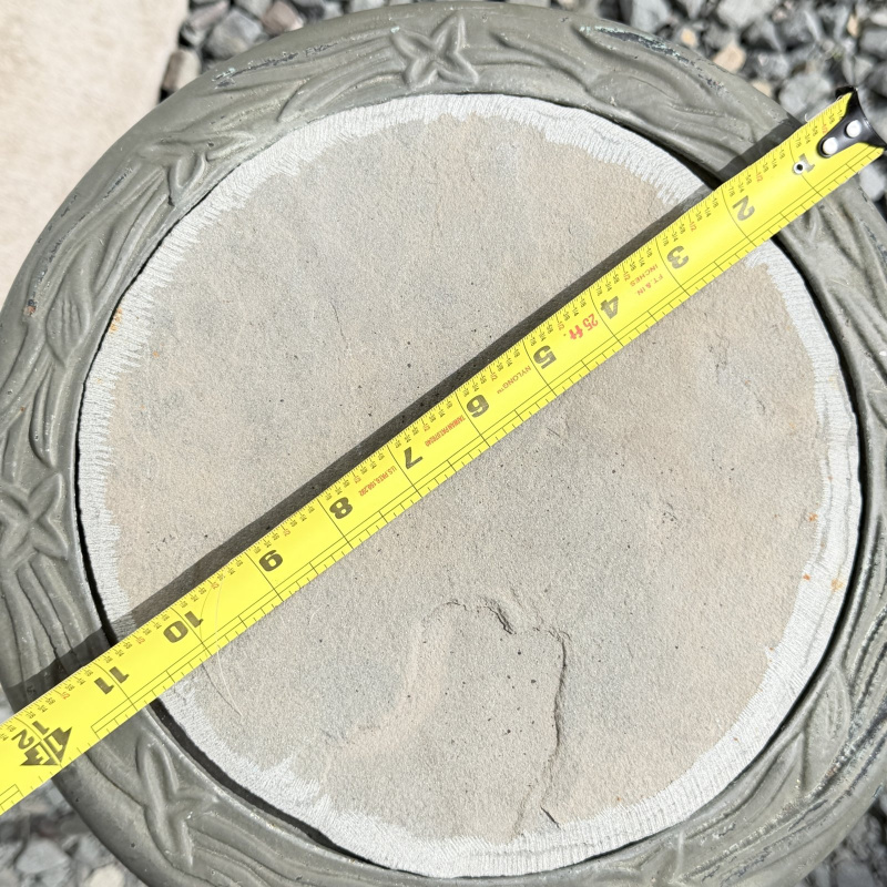 Lot 654: Vintage cast aluminum tri-leg plant stand with floral motif and stone/tile inset top, garden fern & flower design