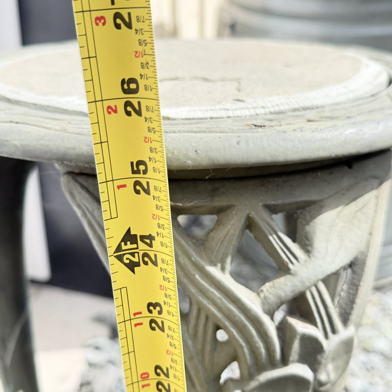 Lot 654: Vintage cast aluminum tri-leg plant stand with floral motif and stone/tile inset top, garden fern & flower design