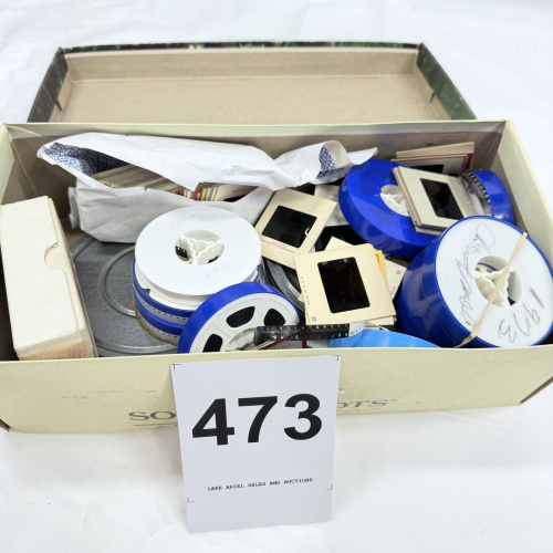 Lot 473: Vintage 8mm home movie film reels and 35mm slides collection, with tins, boxes and viewer sheets