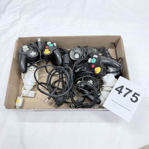 Lot 475: Nintendo GameCube controllers, cables and accessories lot