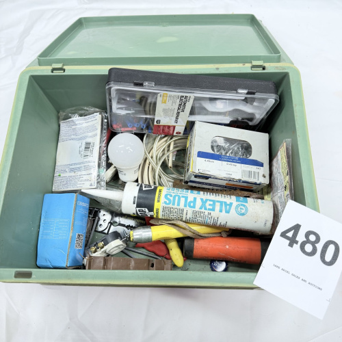 Lot 480: Mixed lot of household tools & hardware: DAP Alex Plus caulk, Secrui door/window alarm, 99-piece automotive electrical repair kit, roofing nails, LED bulb, in green storage tote