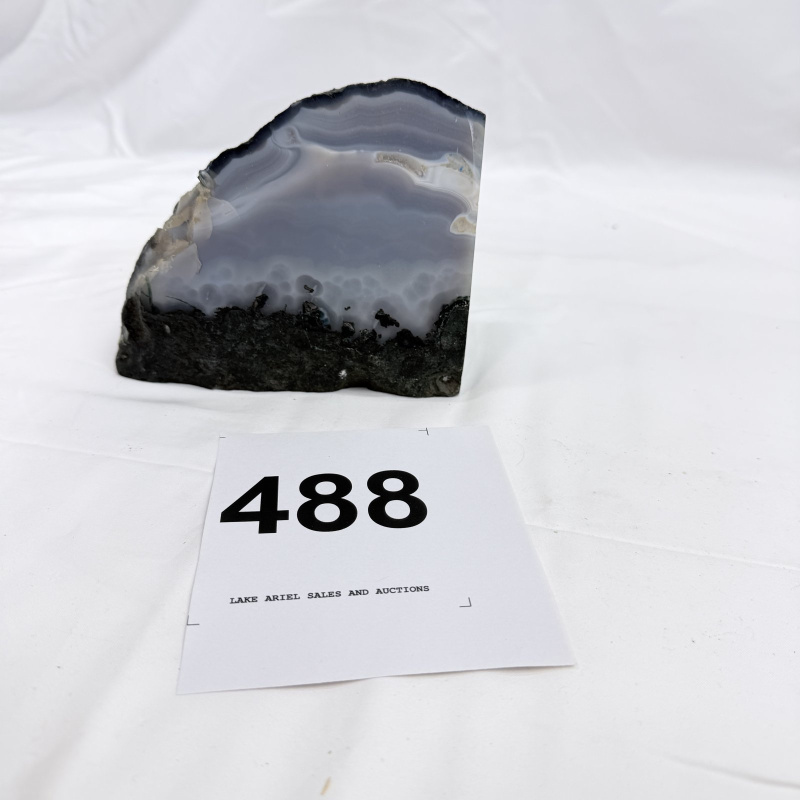 Lot 488: Polished banded agate slice with natural druzy matrix base, mineral specimen bookend/paperweight