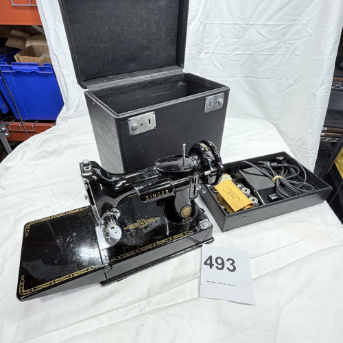 Lot 493: Vintage Singer Featherweight 221 portable electric sewing machine with black case, foot pedal, bobbins & accessories