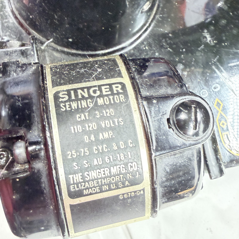 Lot 493: Vintage Singer Featherweight 221 portable electric sewing machine with black case, foot pedal, bobbins & accessories