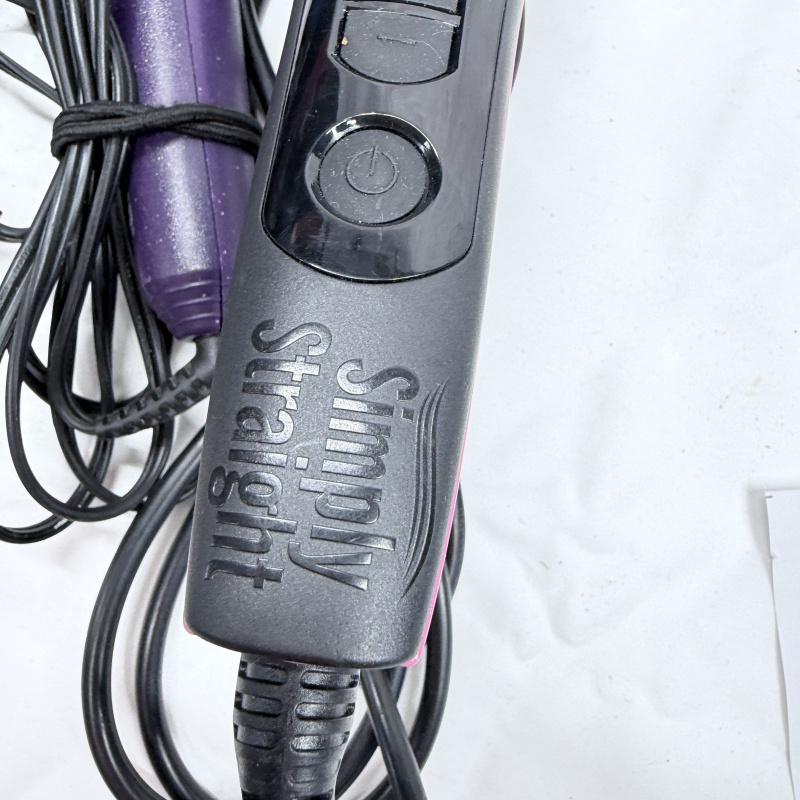 Lot 494: Vintage hair styling tool lot: Sunbeam Hospitality dryer, Simply Straight brush, curling irons, flat irons, and vintage Professional Marcel Iron in box