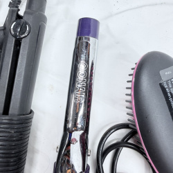 Lot 494: Vintage hair styling tool lot: Sunbeam Hospitality dryer, Simply Straight brush, curling irons, flat irons, and vintage Professional Marcel Iron in box
