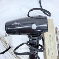 Lot 494: Vintage hair styling tool lot: Sunbeam Hospitality dryer, Simply Straight brush, curling irons, flat irons, and vintage Professional Marcel Iron in box