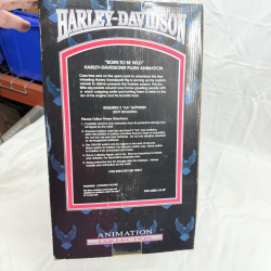 Lot 498: Vintage Harley-Davidson "Born to Be Wild" plush pig on bicycle animated figure, Animation Collection