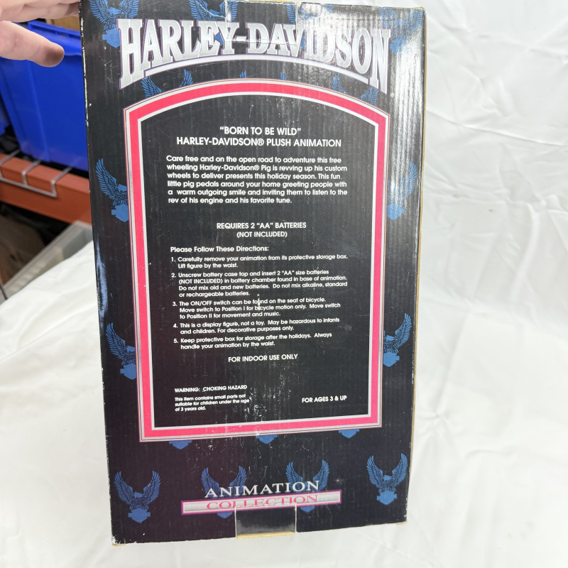 Lot 498: Vintage Harley-Davidson "Born to Be Wild" plush pig on bicycle animated figure, Animation Collection