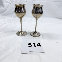 Lot 514: Pair of silver Plate  stemmed goblets, monogrammed "TRS", dated 5-11-73