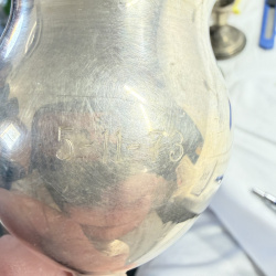 Lot 514: Pair of silver Plate  stemmed goblets, monogrammed "TRS", dated 5-11-73