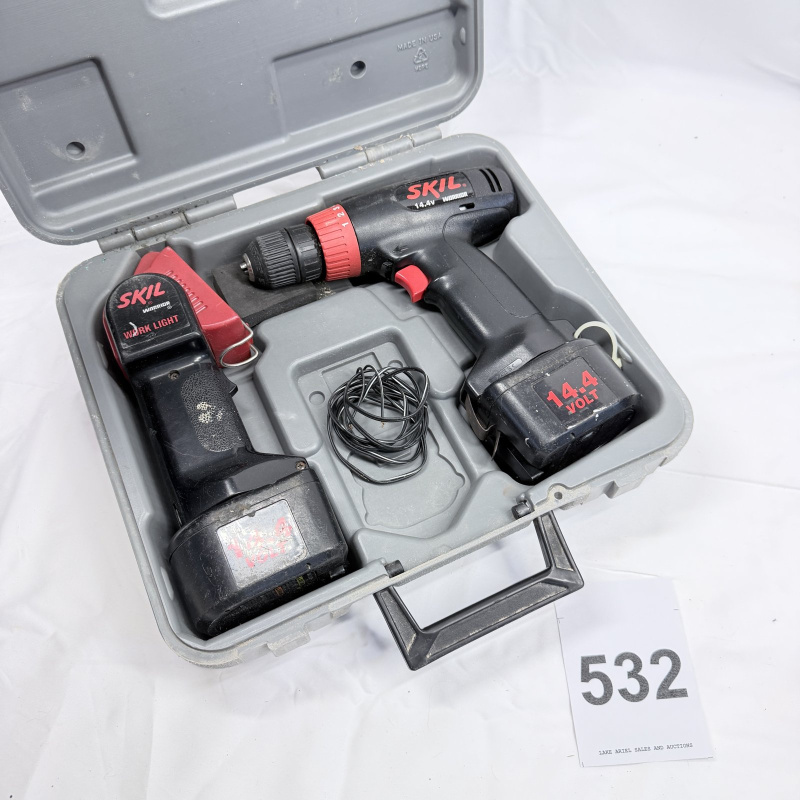 Lot 532: Skil 14.4V Warrior cordless drill with case, two batteries, work light and charger