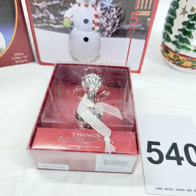Lot 540: Christmas lot: Musical Père Noël lighthouse, Holiday Style 5ft inflatable snowman, Things Remembered glass baby rattle, and ceramic snowman family figurine