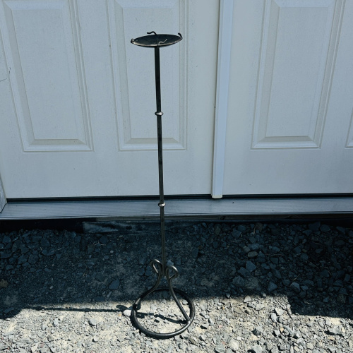 Lot 658: Vintage wrought iron adjustable pricket candle stand, tripod scroll-foot base, 37in floor candlestick