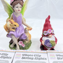Lot 541: Fairy with bunnies & garden gnome resin figurines with 3 Good Vibes Only Photo Clip String Lights sets