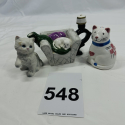 Lot 548: Vintage porcelain cat figurine lot: kitten, sofa planter, candle holder, and coin bank, set of 4