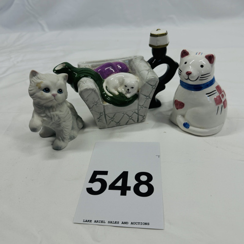 Lot 548: Vintage porcelain cat figurine lot: kitten, sofa planter, candle holder, and coin bank, set of 4